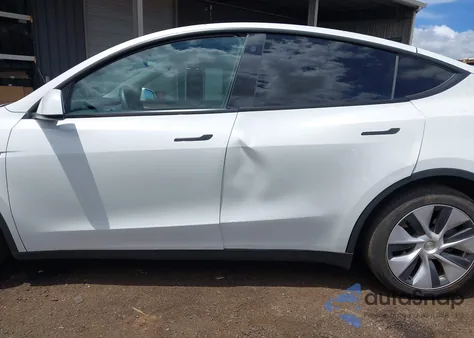 2023 Tesla Model Y Awd/Long Range Dual Motor All-Wheel Drive z USA, uszkodzony, nr VIN 7SAYGDEE1PF752864